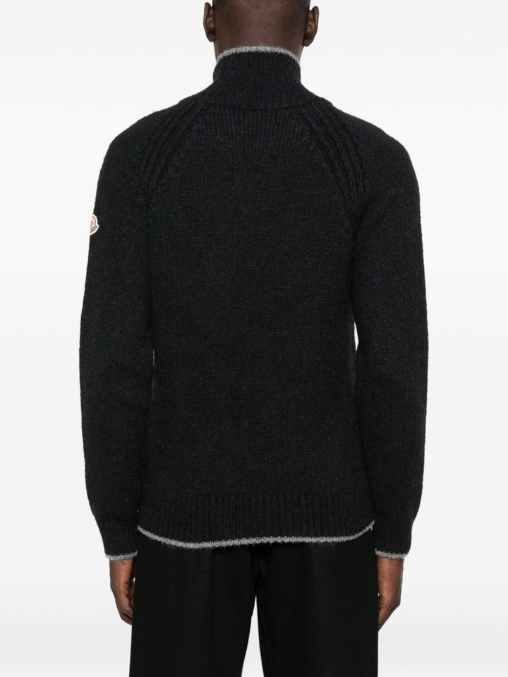 Moncler
Maglione a coste a collo alto
