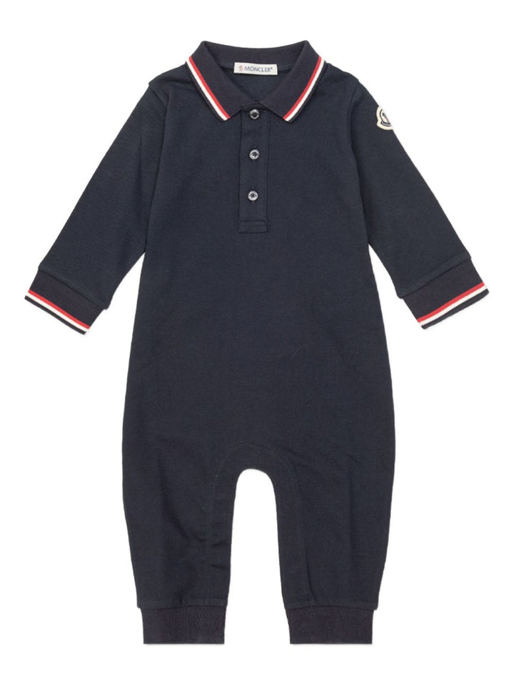 Moncler Enfant
Tutina in cotone piquet con orlo tricolore