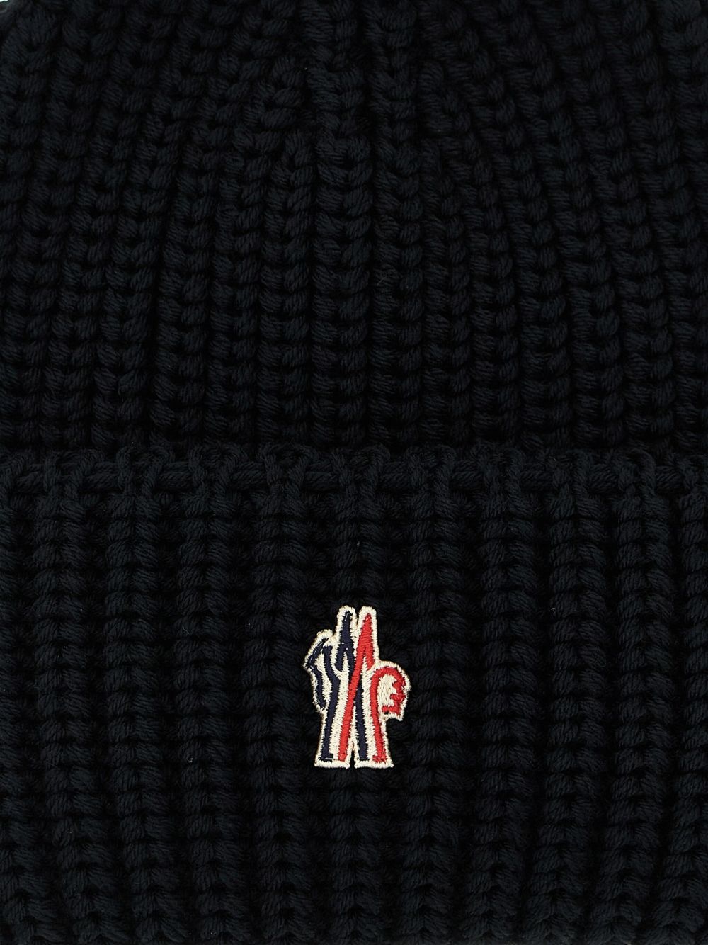 Moncler Grenoble
Berretto a coste con applicazione
