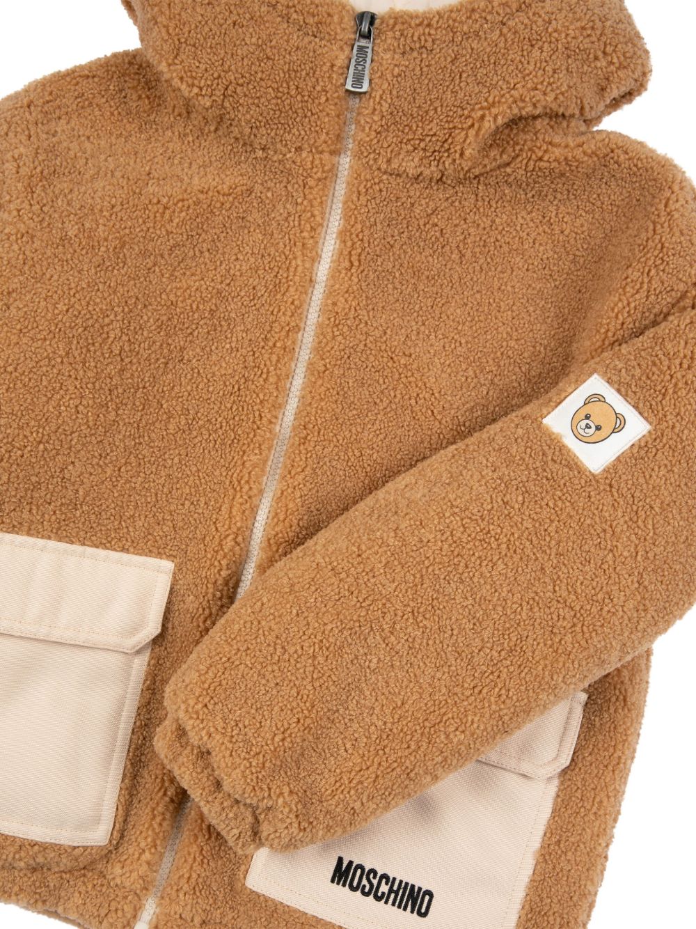 Moschino Kids
Giacca in pelliccia sintetica con cappuccio