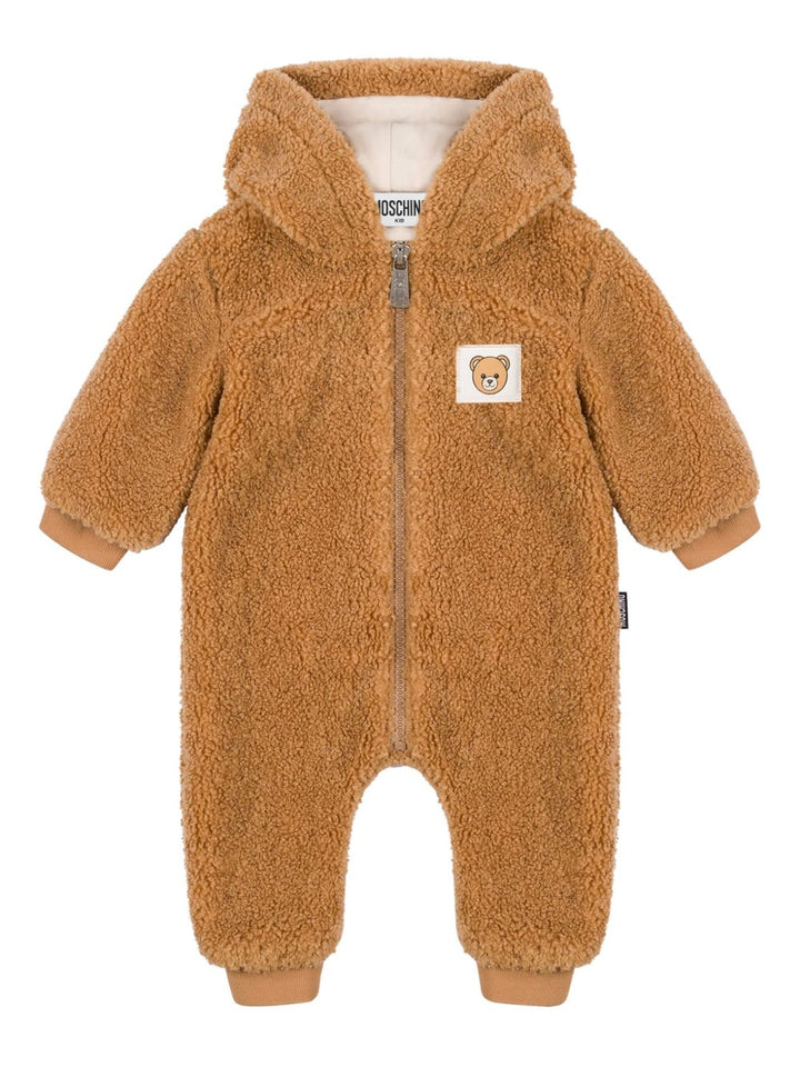 Moschino Kids
Tuta intera con cappuccio in pelliccia sintetica