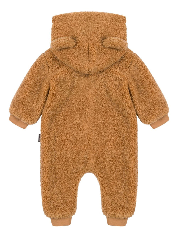 Moschino Kids
Tuta intera con cappuccio in pelliccia sintetica