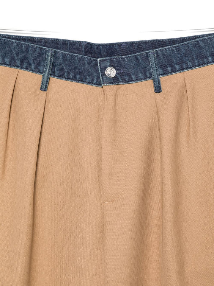 Nine In The Morning
Pantaloni con pannelli in denim