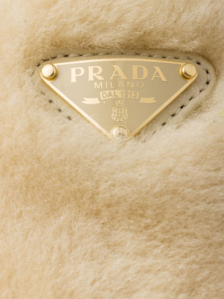 Prada Mules con logo