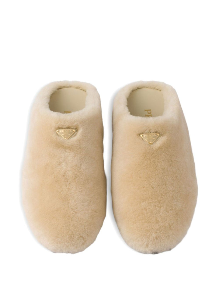 Prada Mules con logo