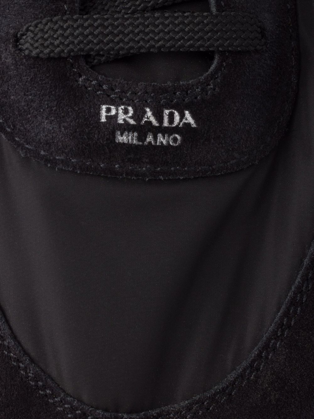 Prada
Sneakers Collapse Re-Nylon in pelle scamosciata