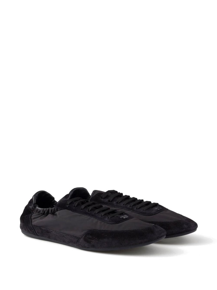 Prada
Sneakers Collapse Re-Nylon in pelle scamosciata