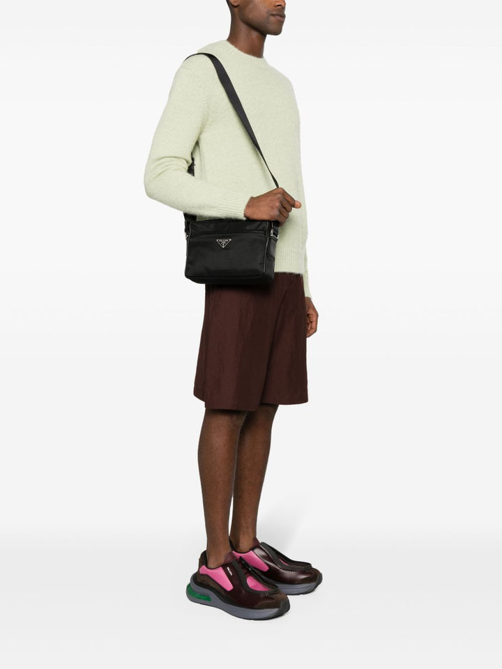 Prada
Borsa messenger con placca logo