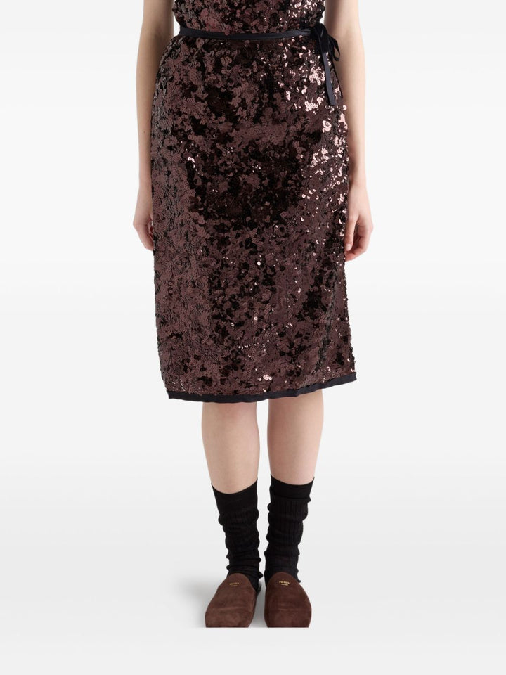 Prada

Gonna con fiocco in paillettes marrone scuro
