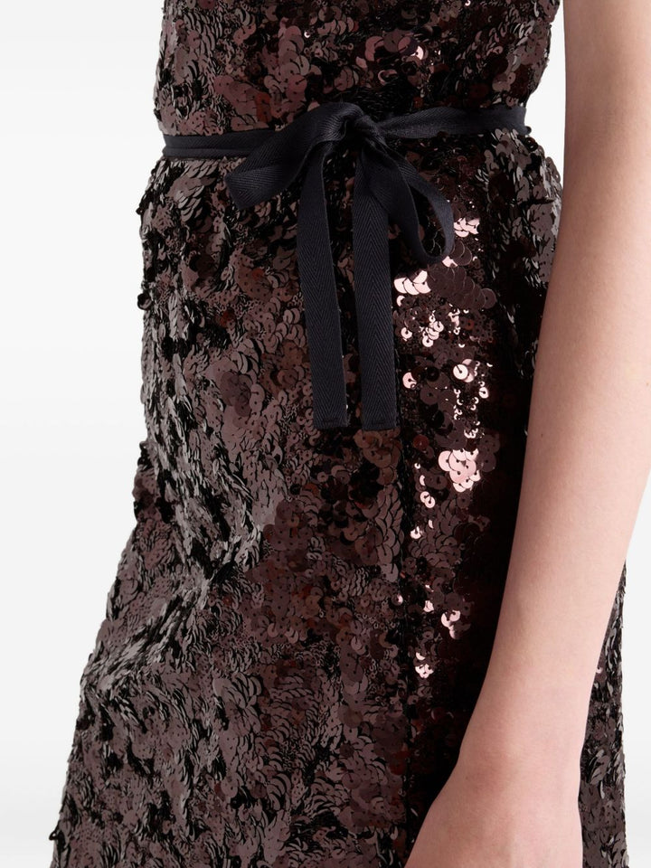 Prada

Gonna con fiocco in paillettes marrone scuro