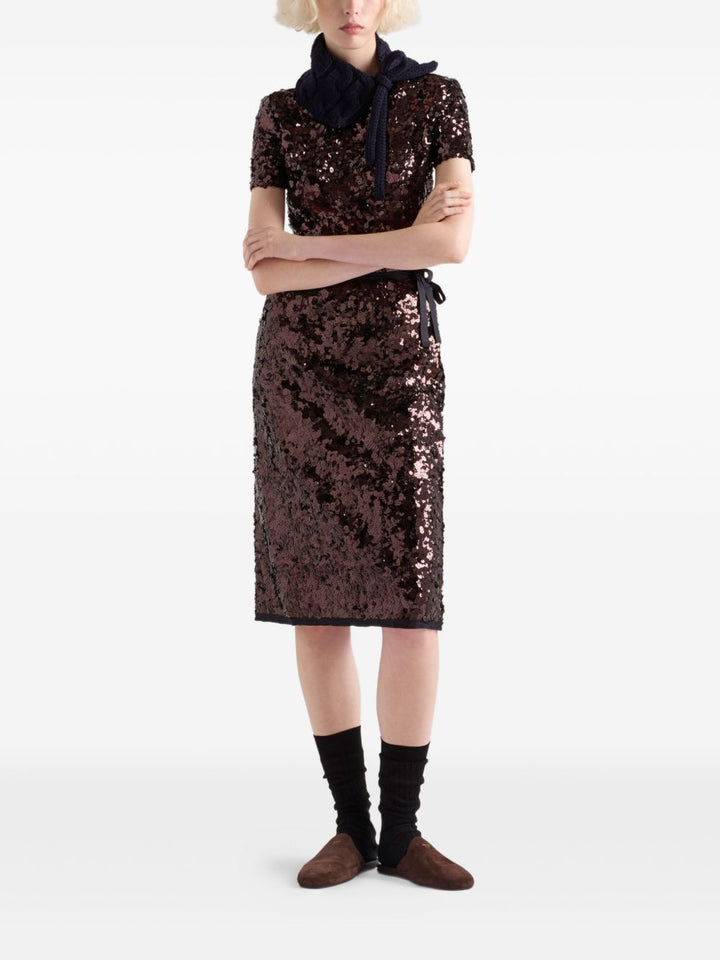 Prada

Gonna con fiocco in paillettes marrone scuro