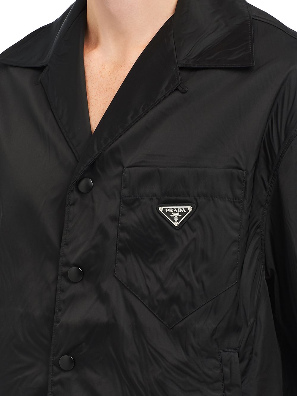 Prada
Camicia con maniche corte