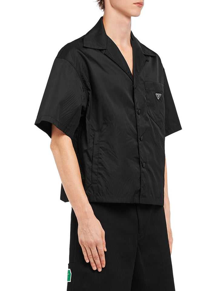 Prada
Camicia con maniche corte