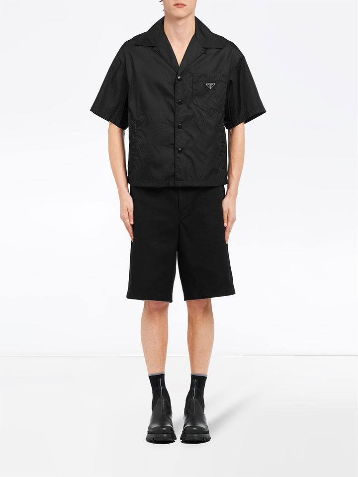 Prada
Camicia con maniche corte