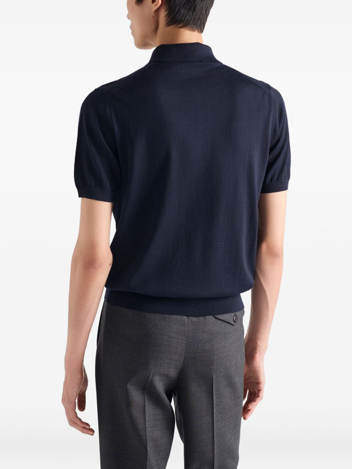Prada
Polo in lana con logo