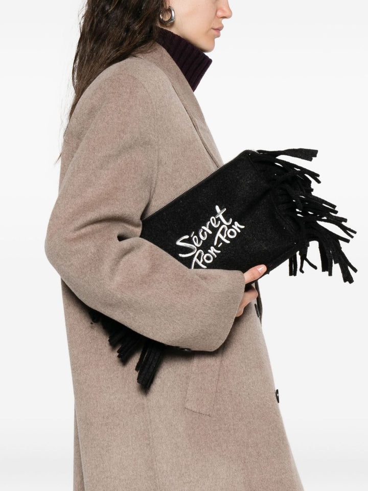 Secret Pom Pom fringed clutch bag