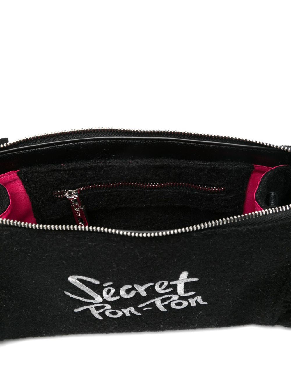 Secret Pom Pom fringed clutch bag