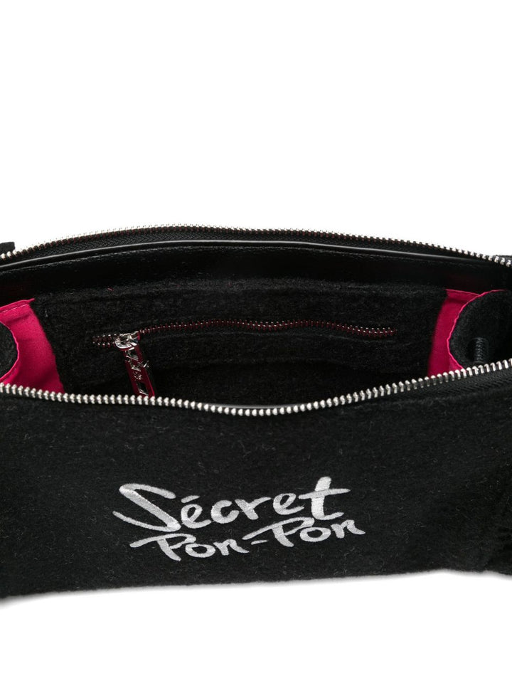 Secret Pom Pom fringed clutch bag