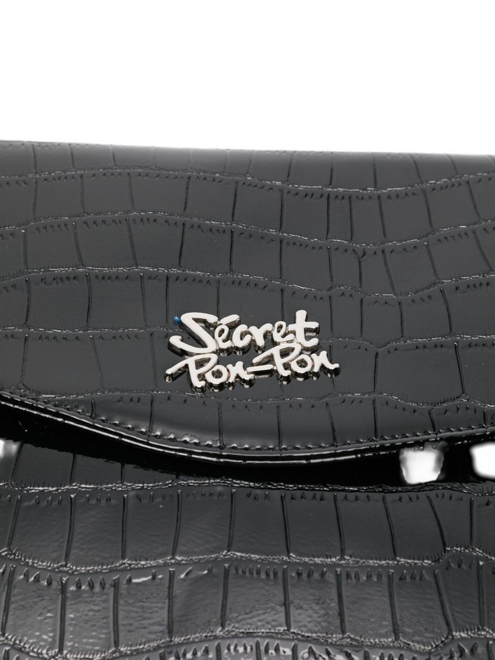 Secret Pon Pon
Pochette con placca logo in coccodrillo goffrato