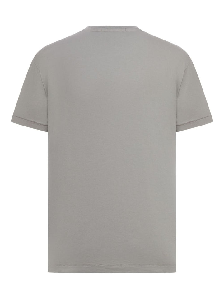 Stone Island
T-shirt in cotone con applicazione
