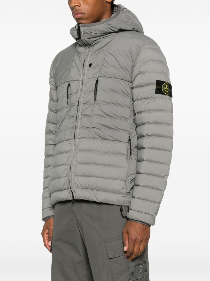 Stone Island
Piumino con cappuccio