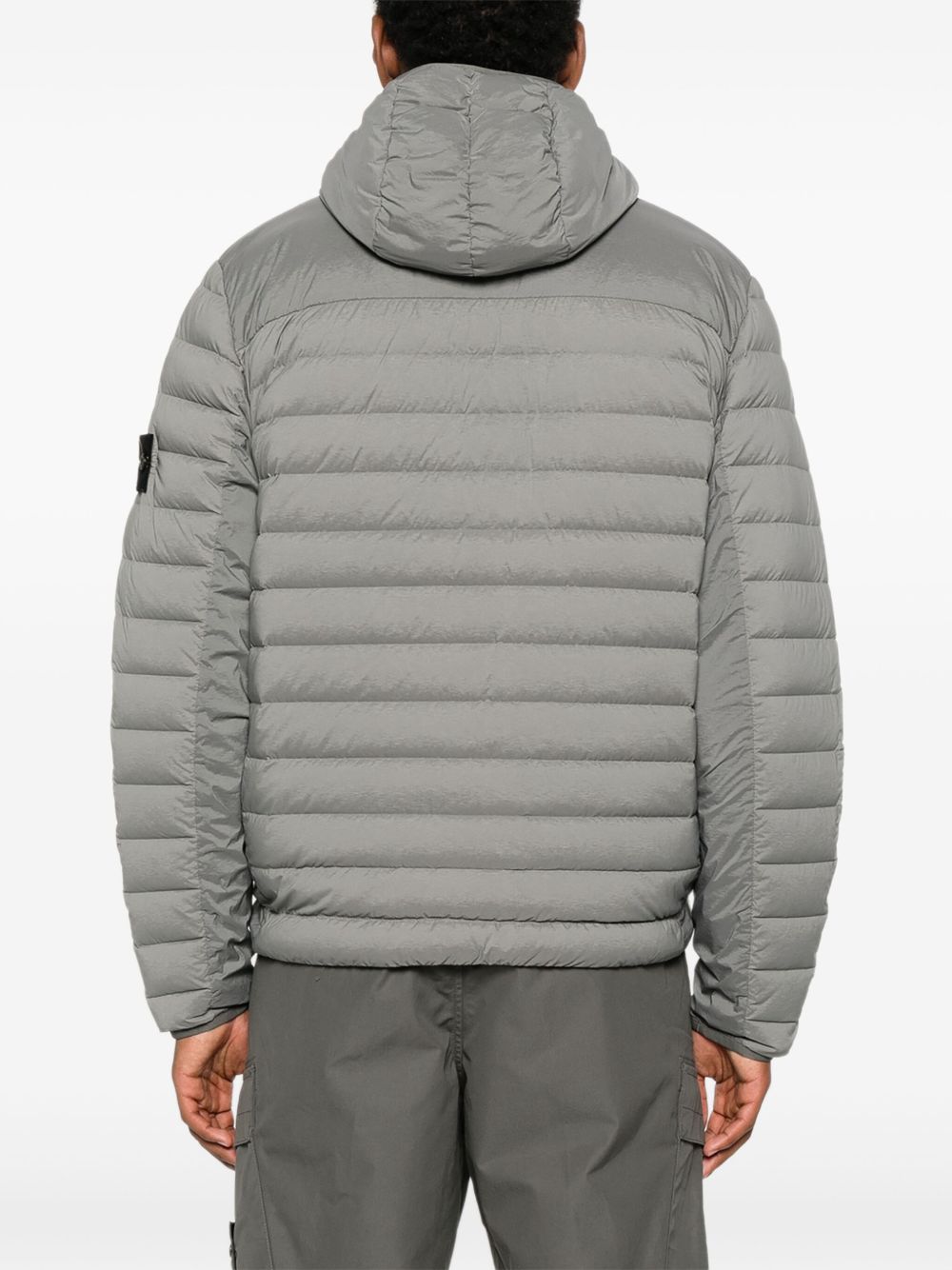 Stone Island
Piumino con cappuccio