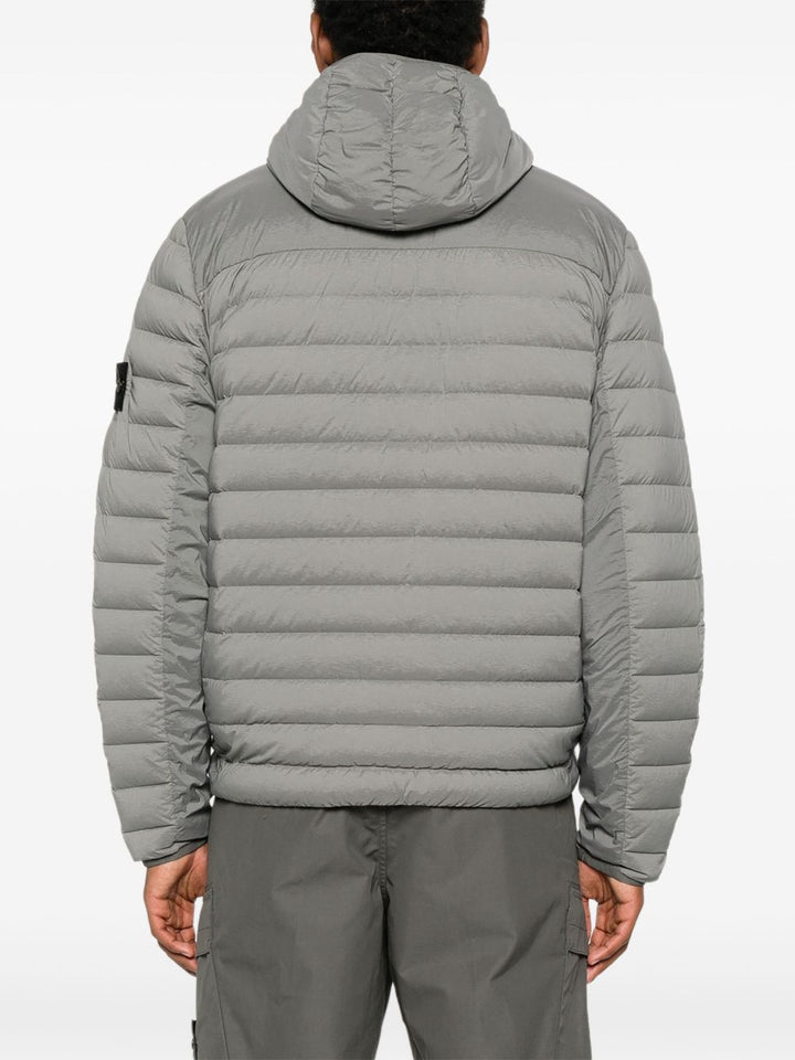 Stone Island
Piumino con cappuccio