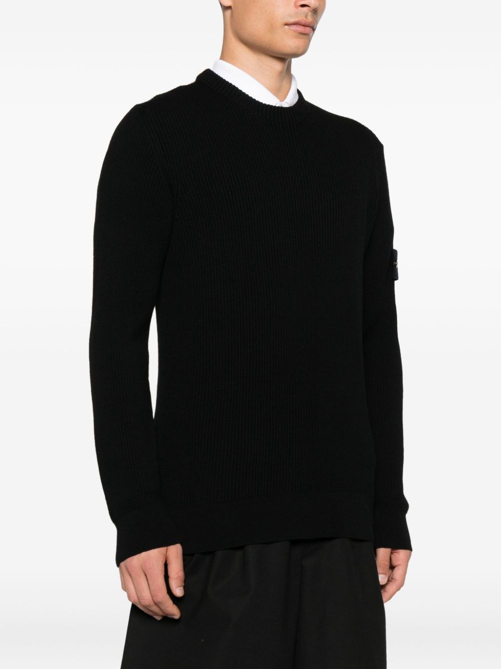 Stone Island
Maglione a coste con applicazione