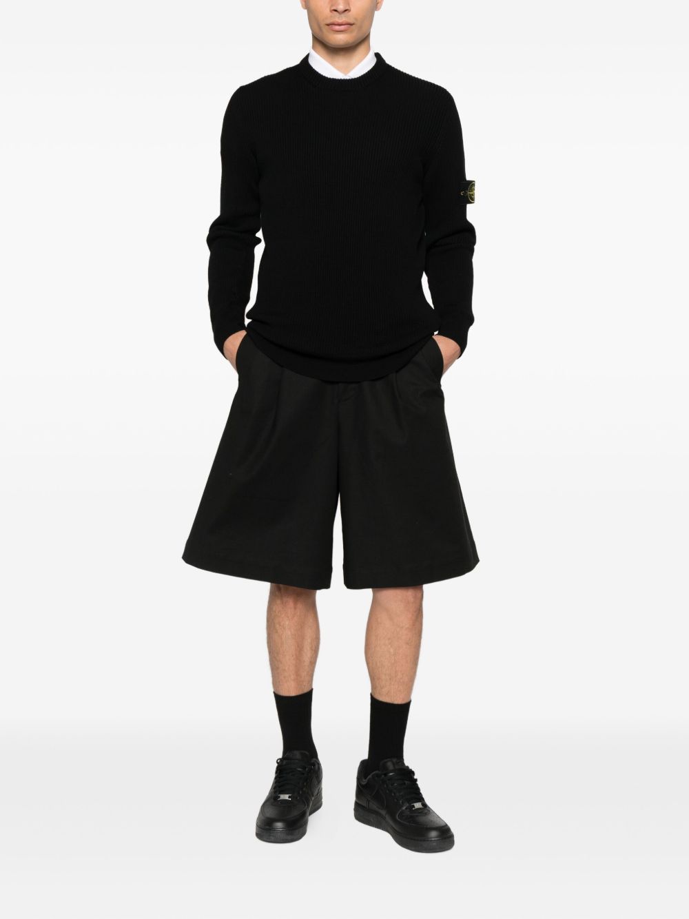 Stone Island
Maglione a coste con applicazione