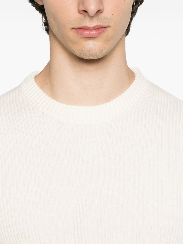 Stone Island
Maglione a coste con patch logo