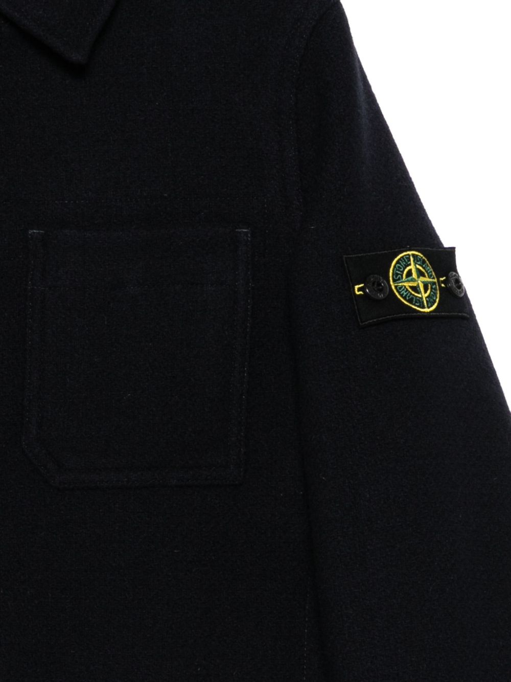 Stone Island Junior
Giacca con zip frontale e tasche applicate