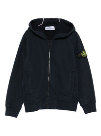 Stone Island Junior
Felpa di colore blu con zip e cappuccio