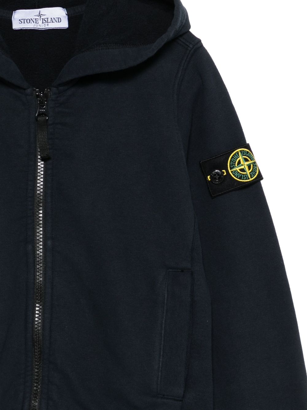 Stone Island Junior Felpa di colore blu con zip e cappuccio
