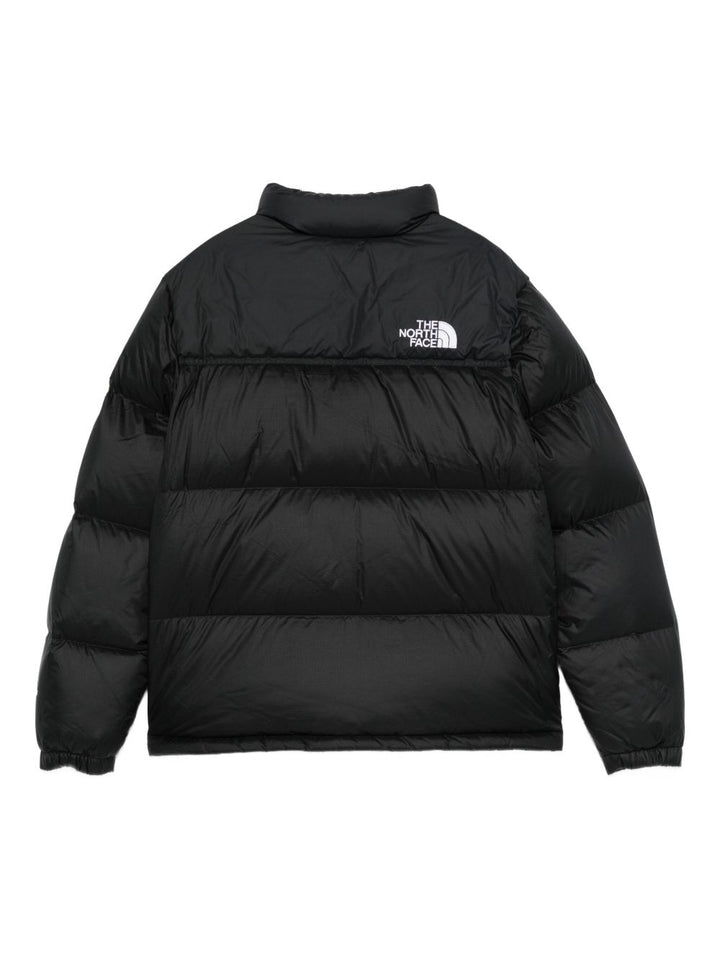 The North Face kids piumono nero con zip