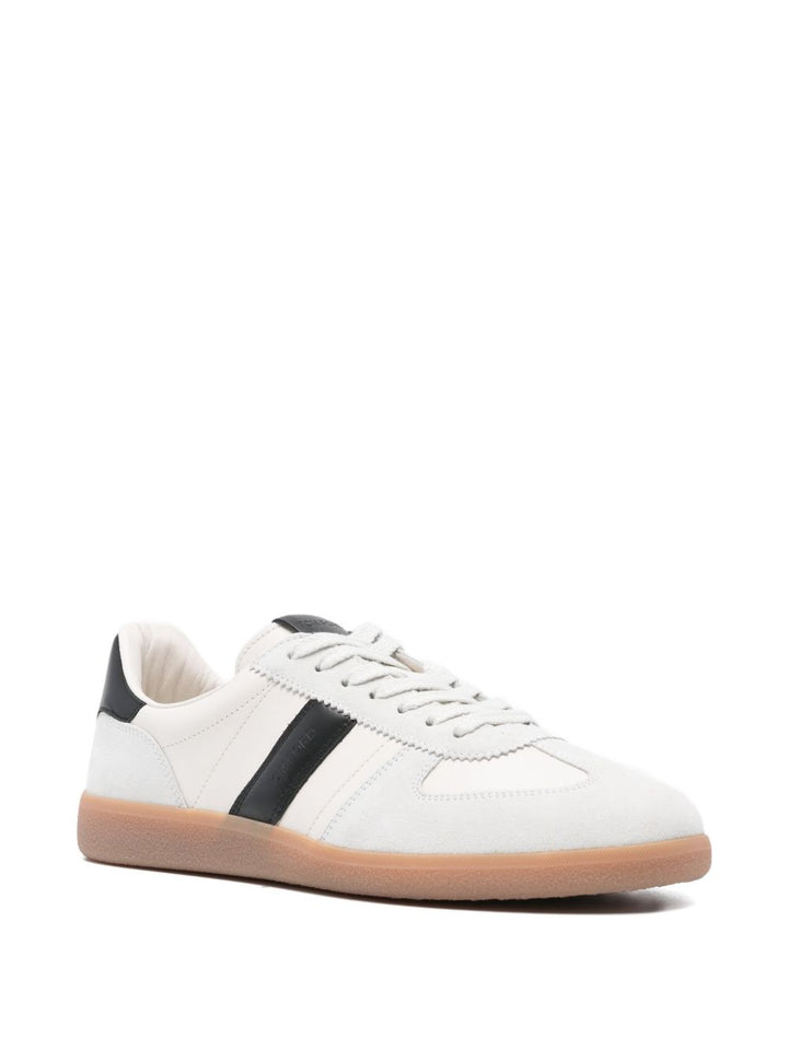 TOM FORD
Sneakers a righe in pelle scamosciata