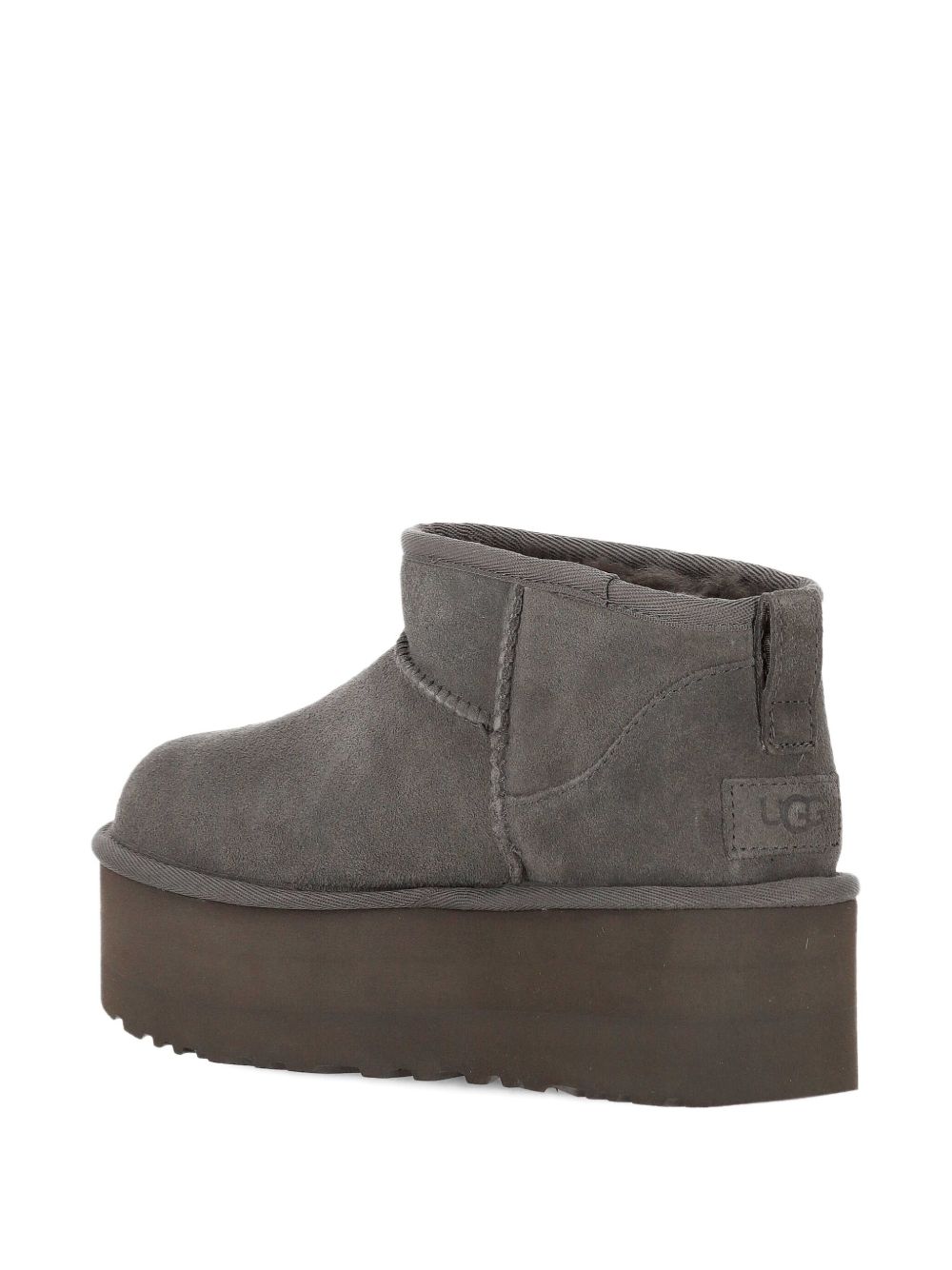UGG
Stivali con plateau 51mm
