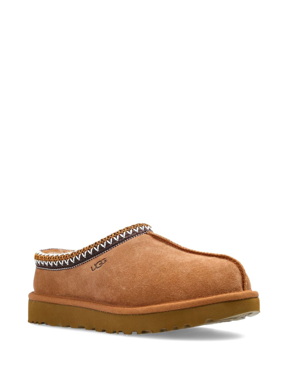 UGG in montone con finiture intrecciate