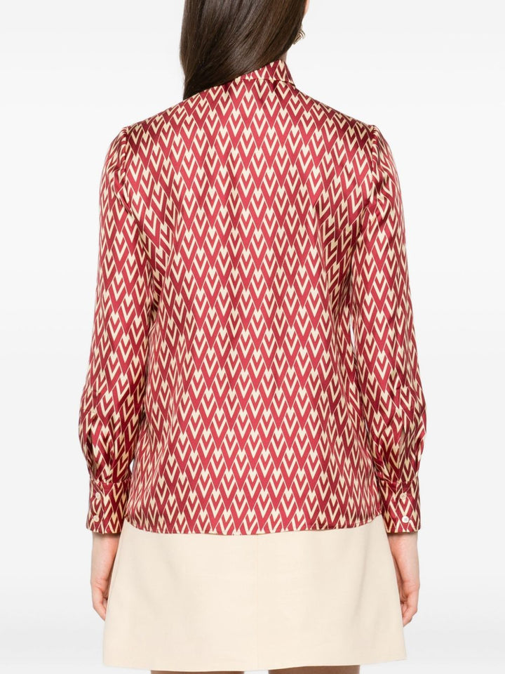 Valentino Garavani
Camicia in seta con stampa geometrica