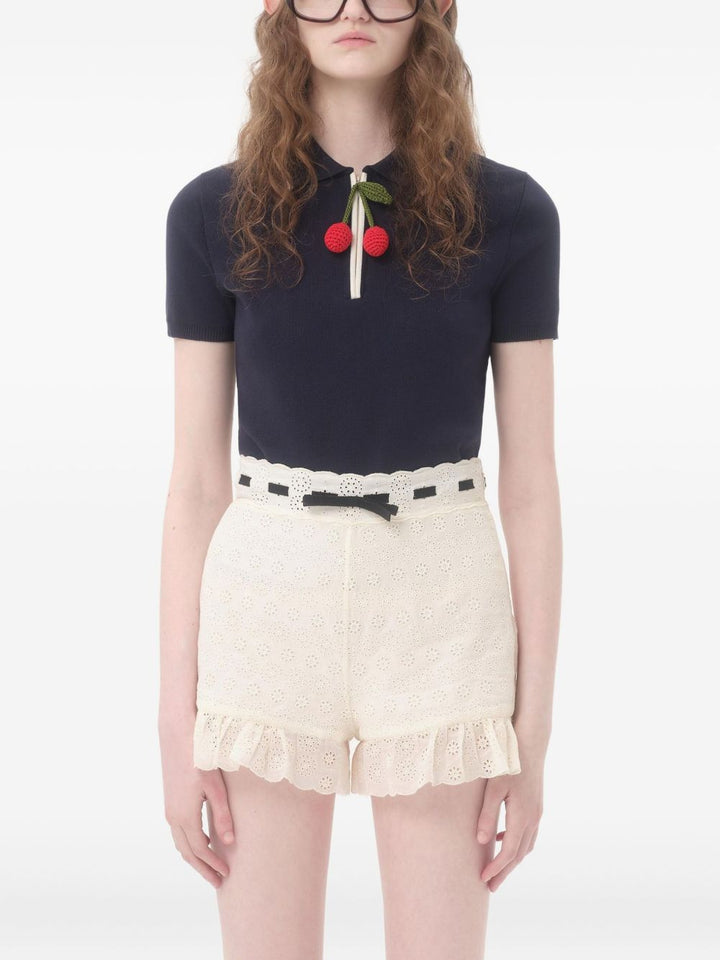 Valentino Garavani
Polo con ciondolo Cherry