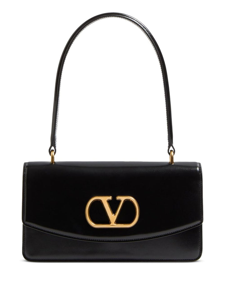 Valentino Garavani
Borsa nera con patta superiore