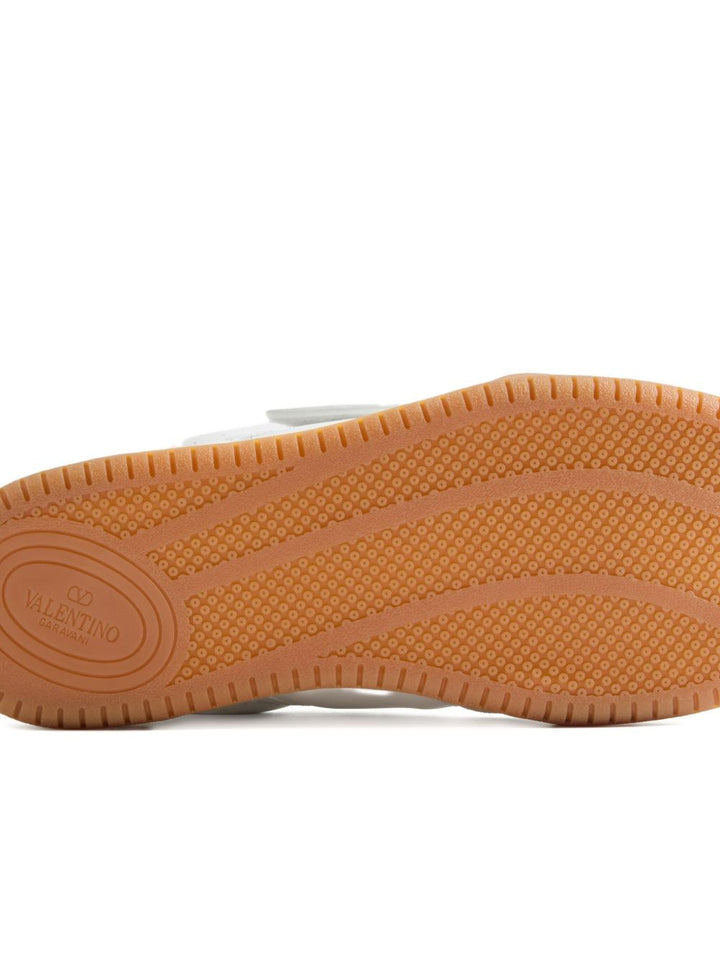 Valentino Garavani
sneakers con cinturino traforato