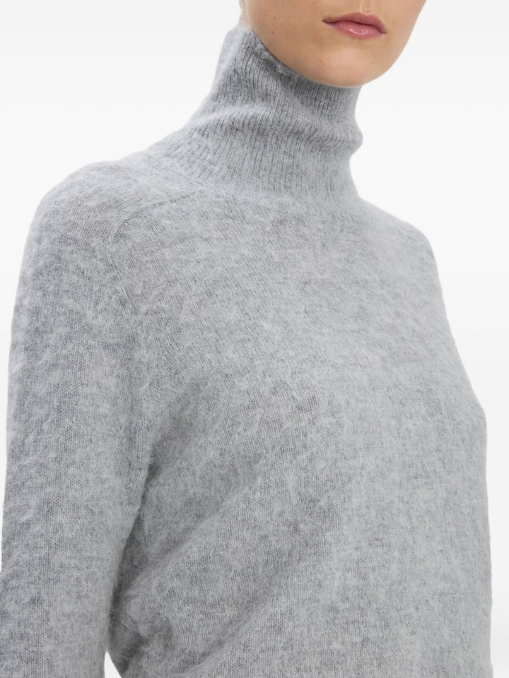 Victoria Beckham
Maglione collo alto grigio