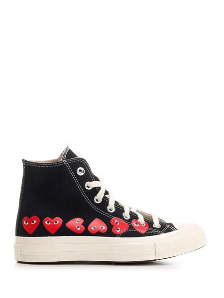 Comme Des Garcons Play
Sneakers "Chuck Taylor" alte nere