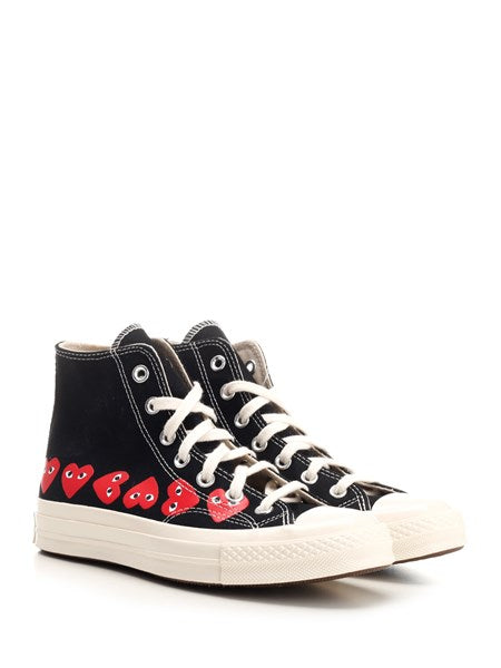 Comme Des Garcons Play
Sneakers "Chuck Taylor" alte nere