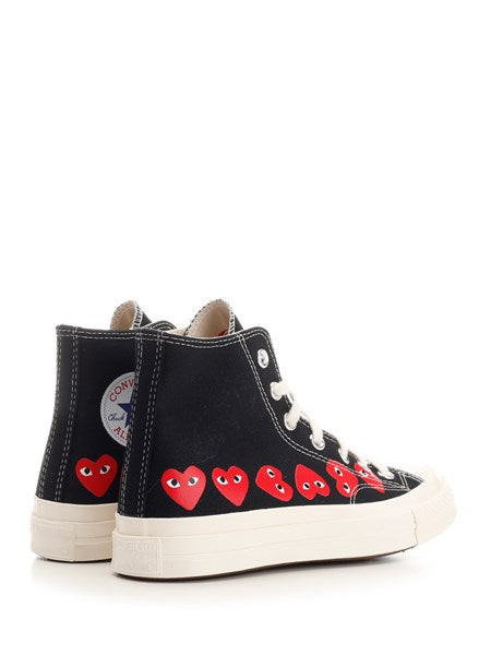 Comme Des Garcons Play
Sneakers "Chuck Taylor" alte nere