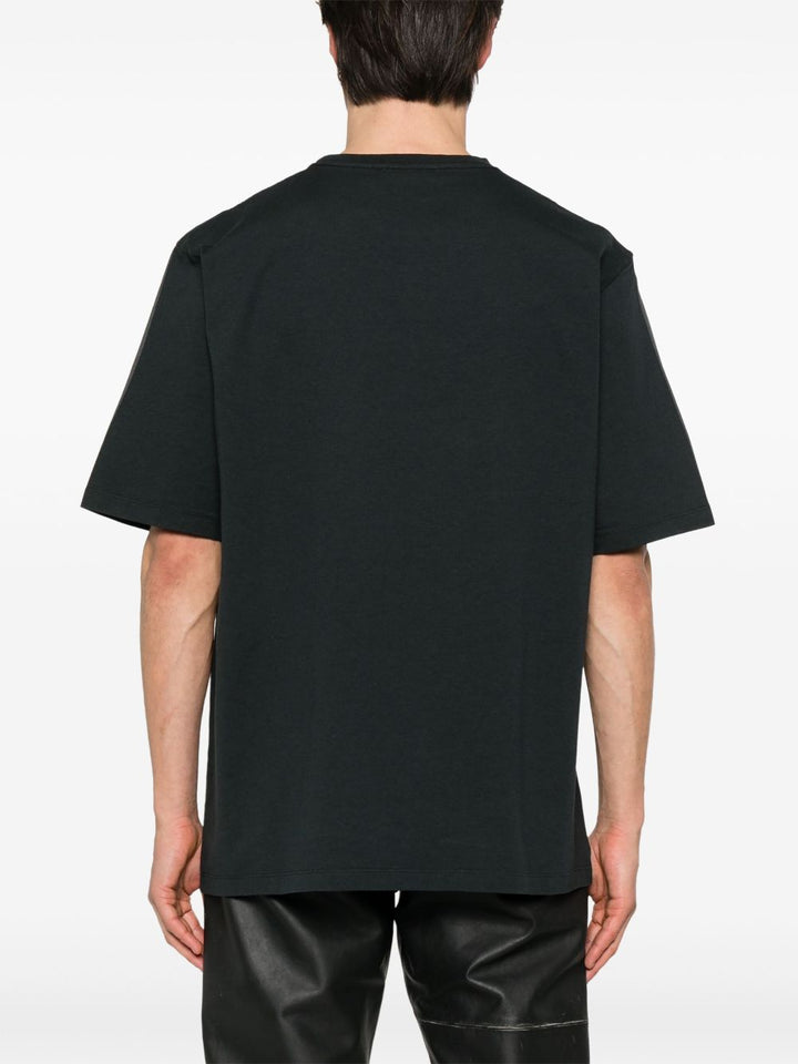 Alexander McQueen
T-shirt con logo ricamato