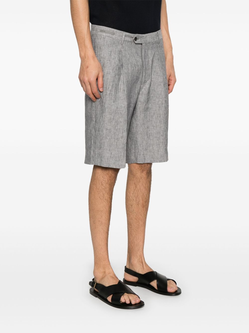 Corneliani
Chino corti con pieghe