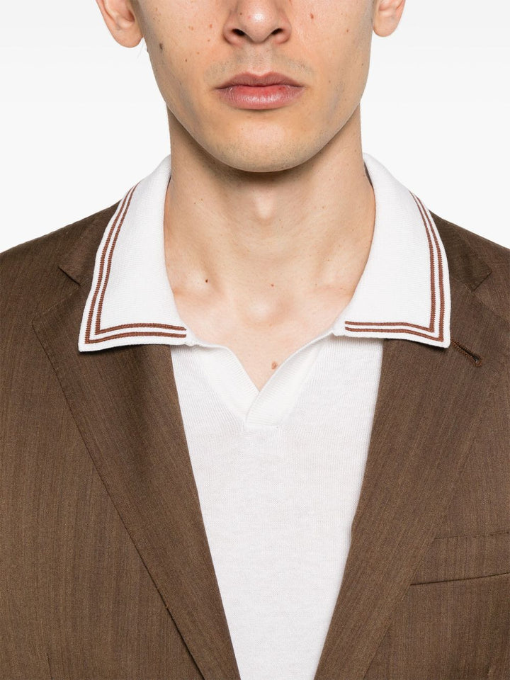 Corneliani
Polo con dettaglio a righe