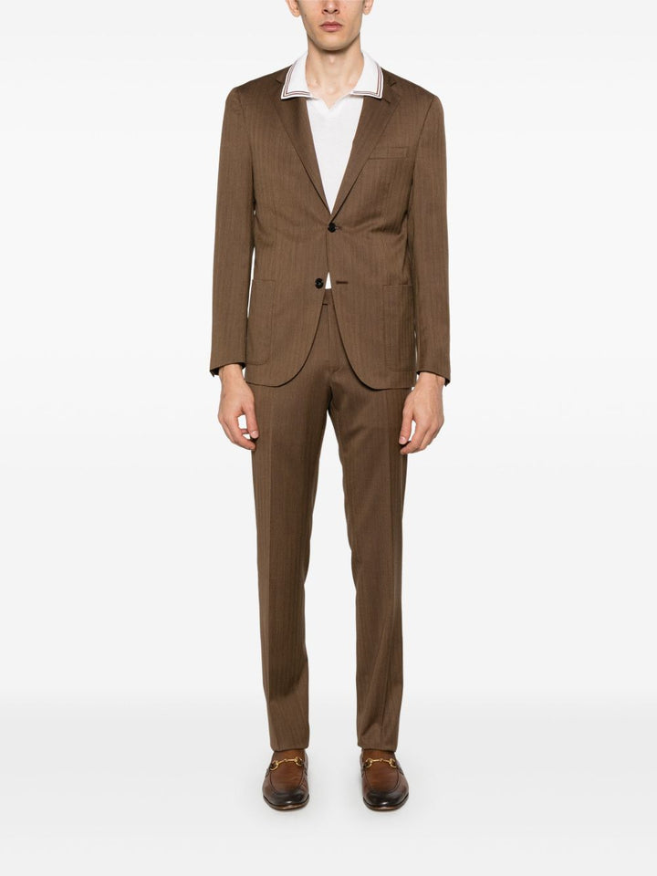 Corneliani
Polo con dettaglio a righe