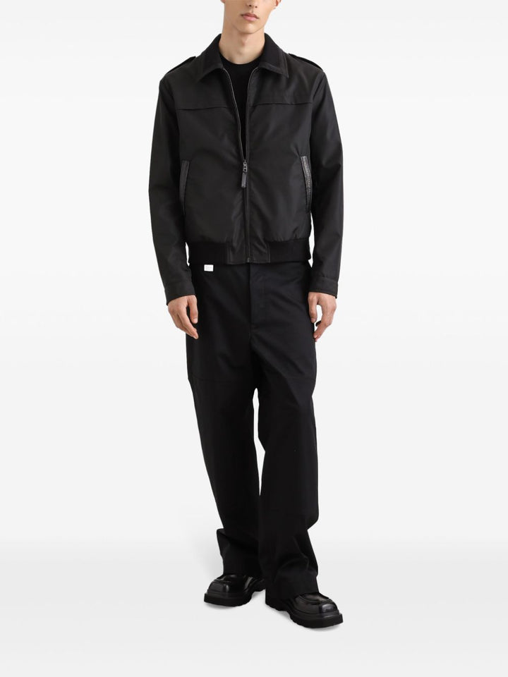 Dolce & Gabbana
Pantaloni con placca logo